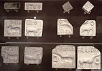 Seals with Indus script and impressions; 2500-2000 BC; steatite; various sizes, mostly c.3 cm; British Museum (London)[25]