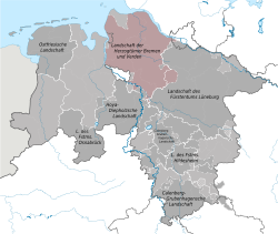 Former Bremen-Verden as of 1730 (in light pink) pasted over today's state borders (grey) and former region borders (white, as of 1977) with broken lines, indicating their changes between 1731 and 1977. At the northern tip the Land of Hadeln and Cuxhaven are excluded.[1]