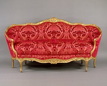 An Ottomane sofa (1750-60) by Jean Baptiste Tilliard, in an oval shape, an example of the Turquoise or Turkish style
