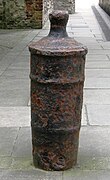 Old cannon used as bollard, outside the church of St Helen's Bishopsgate, London