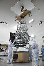 WISE being connected to its adapter for launch