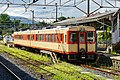 Koumi Line 2-car set KiHa 111-111 + KiHa 112–111 in vermillion and cream JNR express train livery in August 2016