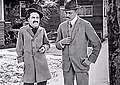 Screenshot of Charlie Chaplin (left) in scene with Henry Lehrman in "Making A Living"