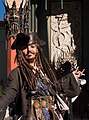 Image 83A person costumed in the character of captain Jack Sparrow, Johnny Depp's lead role in the Pirates of the Caribbean film series (from Piracy)