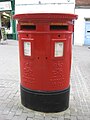 A British pillar box with two apertures, one for stamped, and the other for franked, mail