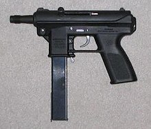 An Intratec TEC-DC9 with a 32-round magazine. This semi-automatic pistol has a threaded barrel and a magazine that attaches outside the pistol grip, two of the features listed in the Federal Assault Weapons Ban.