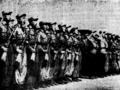 Korean People's Army Ground Force unit stands in formation, 1950.png