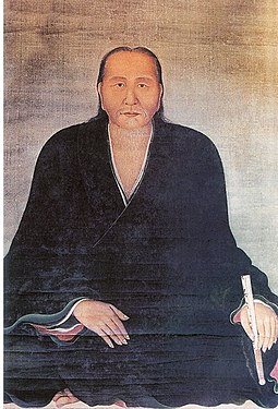 Portrait of Nguyễn Quý Đức in Đàng Ngoài. He was wearing a cross-collared robe (áo tràng vạt) and had loose long hair.