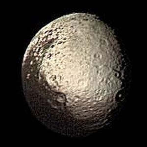 Enhanced version of an image of Iapetus by Voyager 2. The left side of Iapetus in this image is its side that is always facing away from Saturn.[57]