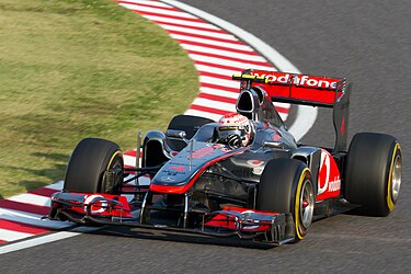 Jenson Button en route to his first dry win for McLaren at the 2011 Japanese Grand Prix