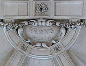 Keystone from the early church, with Oratory motto "Jesus and Mary"