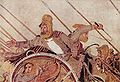 Dareios III. und die ihn umgebenden persischen Krieger tragen phrygische Mützen mit langen Seitenlaschen (bzw. Baschlik), deren weicher Beutel teils nach vorne, teils nach hinten fällt, beim König aufgerichtet steht. Alexandermosaik, Pompeji, 2. Jh. v. C.