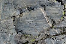 Glacial striations on an eroded rock alongside the Moiry Glacier, Switzerland
