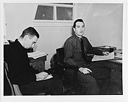 Y3c C. S. Foley (left) taking dictation from LCDR William P. Mack, NAS Adak, AK, 1943.