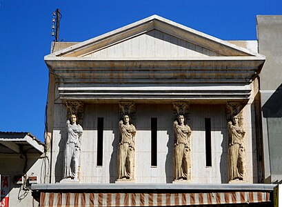 Postmodern cast stone caryatids in Nogales, Mexico, unknown architect, unknown date