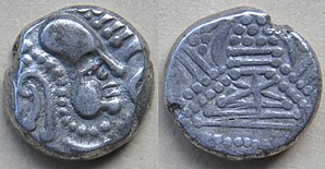 Drachma of the Saindhava or Chalukya dynasties dating from about 800–950. The front represents a bust, turned right of Indo-Sassanian style with points, and the back contains a stylized fire. of Jayadratha dynasty