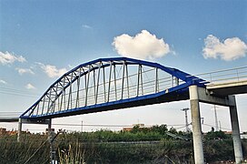 The GFRP Lleida Pedestrian Bridge, the first and longest through arch made up in Fibre-reinforced plastic.