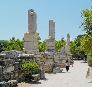 The remains of Triton-shaped atlantes from the Odeon of Agrippa, Athens, Greece