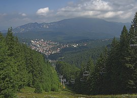 View of Predeal from Clăbucet-plecare Chalet (1445m);[1] behind is the Postăvarul massif