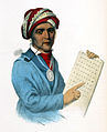 Sequoyah mit einer Tabelle der von ihm entwickelten Cherokee-Schrift