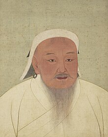 Portrait of an old, bearded man, dressed in white clothing.