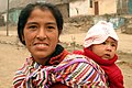 Image 20Amerindian woman with child (from Demographics of Peru)