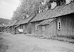 Road with houses at the Eikeland verk in 1939
