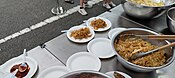 Small plates of char kway teow served at a Singapore carnival