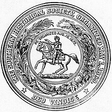 Circular seal with the motto: "The Southern Historical Society, Organized May 1, 1869; Deo Vindice" The central device is a man on a horse, with the text "Re-organized Aug.15.1873.", surrounded by a wreath of assorted plants.