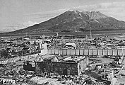 The bombed out ruins of a Kagoshima residential area with Sakurajima in the background, 1 November 1945