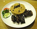 Nasi kebuli with goat meat.