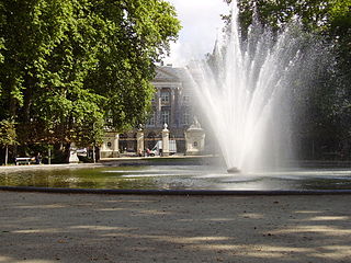 The park's main fountain with the Palace of the Nation in the background