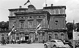 The white-red-white flag being used by the Belarusian Central Rada alongside the Flag of Nazi Germany in June 1943