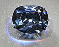 19. Close-up view of the Hope Diamond, a navy-blue diamond.