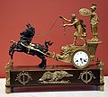 A well-known model of a chariot clock in the Empire style, the chariot of Telemachus by Jean-André Reiche, France, c. 1809.