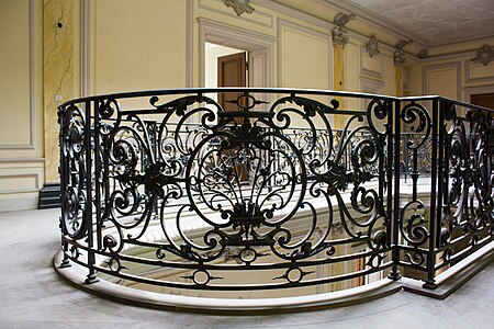Baroque Revival palmette, very similar to those from the Louis XIV style, of a wrought railing in the Château Burrus (Rue Maurice Burrus no. 74) Sainte-Croix-aux-Mines, France, by Jules Berninger and Gustave Krafft, 1900