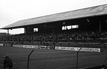 A black and white led photograph of a football stand