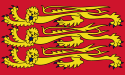 The royal banner of England: a red flag with three pale golden lions passant guardant with blue claws and tongues, each on its own row.