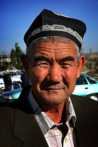 An Uzbek man wearing a skullcap, otherwise known as doppa or tyubeteika