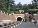 The tunnel to headshunt with parked tractor, looking north