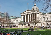 The UCL main building, in stone with a classical portico topped by a large dome