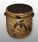 Kiseto water jar, clay covered with glaze and iron-brown splashes and black lacquer cover, Momoyama or Edo period, 17th century