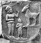 Woman with child and goat.