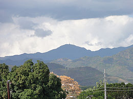 Cerro de Punta, Puerto Rico's highest peak, from downtown Ponce.