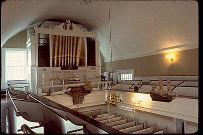 Church interior with balcony and organ