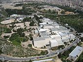 Aerial photograph of the Israel Museum, with the Knesset in the background
