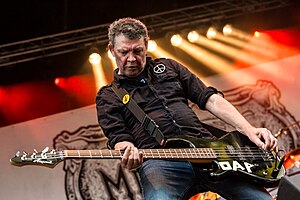 Frank Healy performing with Memoriam in 2022.