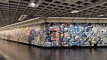 Photograph of Milenko's mosaics on a subway wall