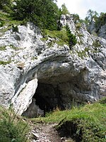 The entrance to the Potočka Zijalka, a cave in the Eastern Karavanke, where the remains of a human residence dated to the Aurignacian (40,000 to 30,000 BP) were found.[32]