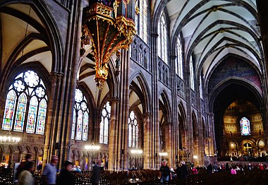 The three levels of the nave; arcades and collateral aisles (bottom); triforium, and upper windows